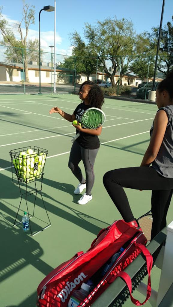 women getting ready for tennis