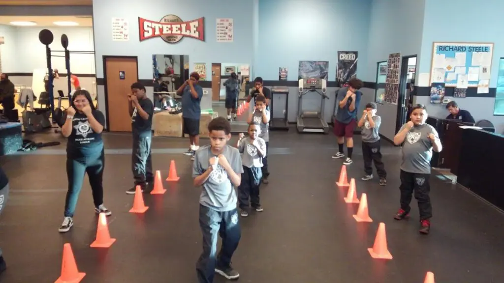 children practicing punches